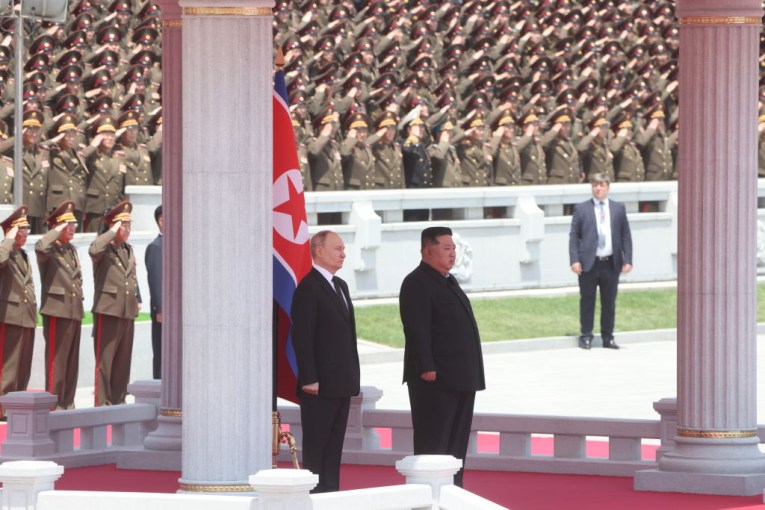 Putin and Kim sign deal in pomp-filled ceremony