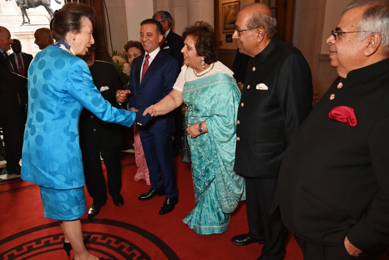 Kamal and Prakash Hinduja (far right) meet Princess Anne in 2023.