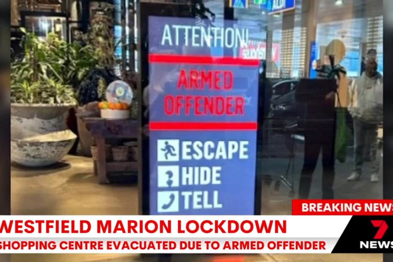 Signs inside the shopping centre warned of an armed offender.