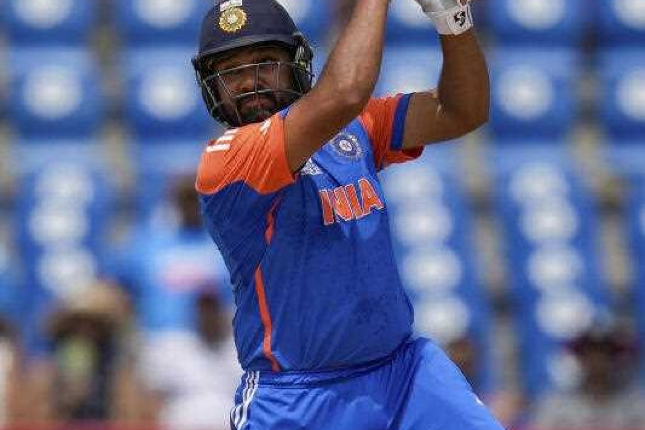 India's Rohit Sharma smashed the fastest ever 50 by a player against Australia.
