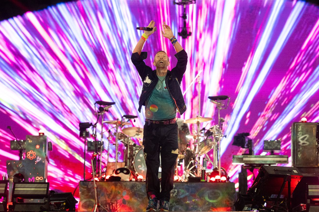 Qantas says a Coldplay concert is behind a jump in airfares to Melbourne.