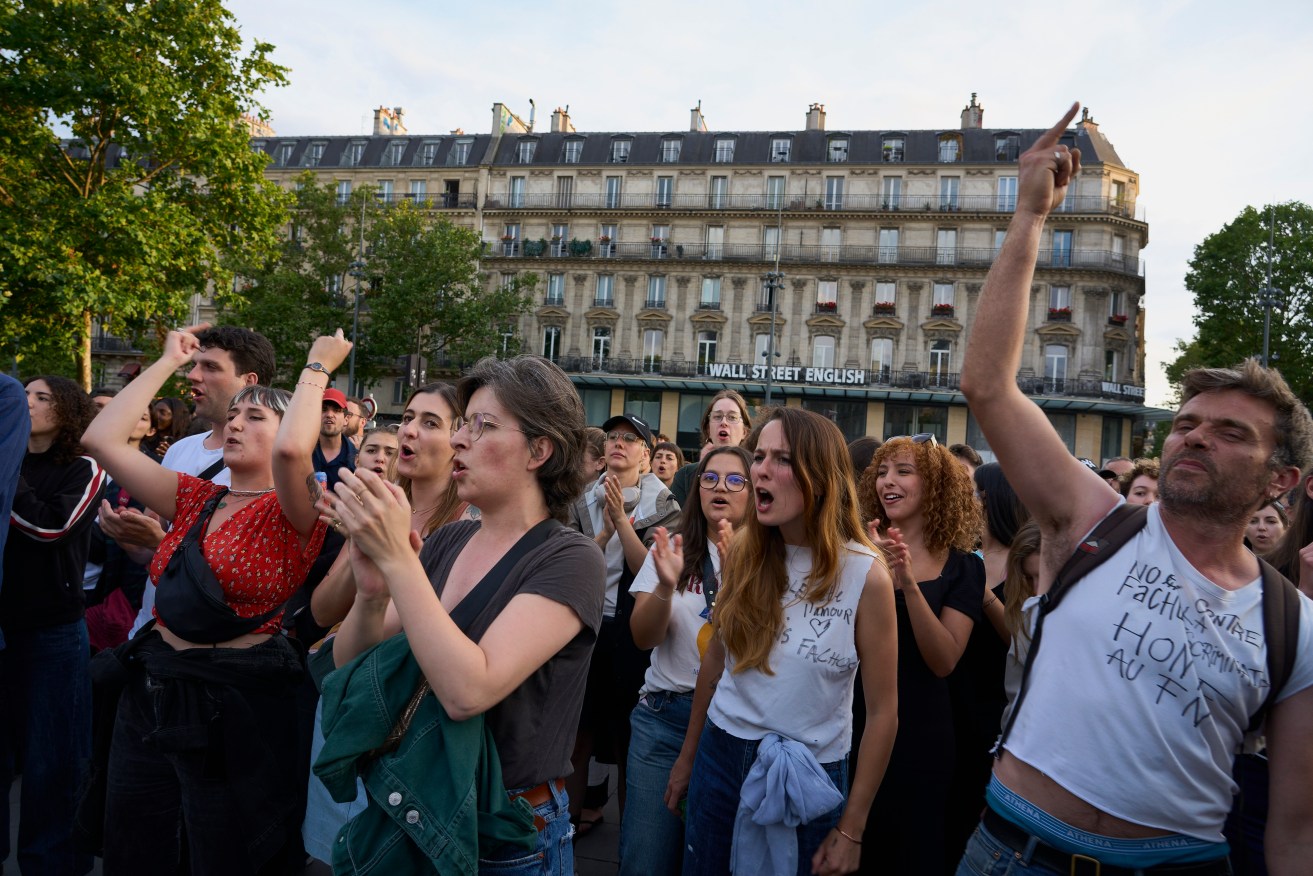 People gathered on the Place de la Republique to denounce the electoral rise of the far-right party after first-round elections.
