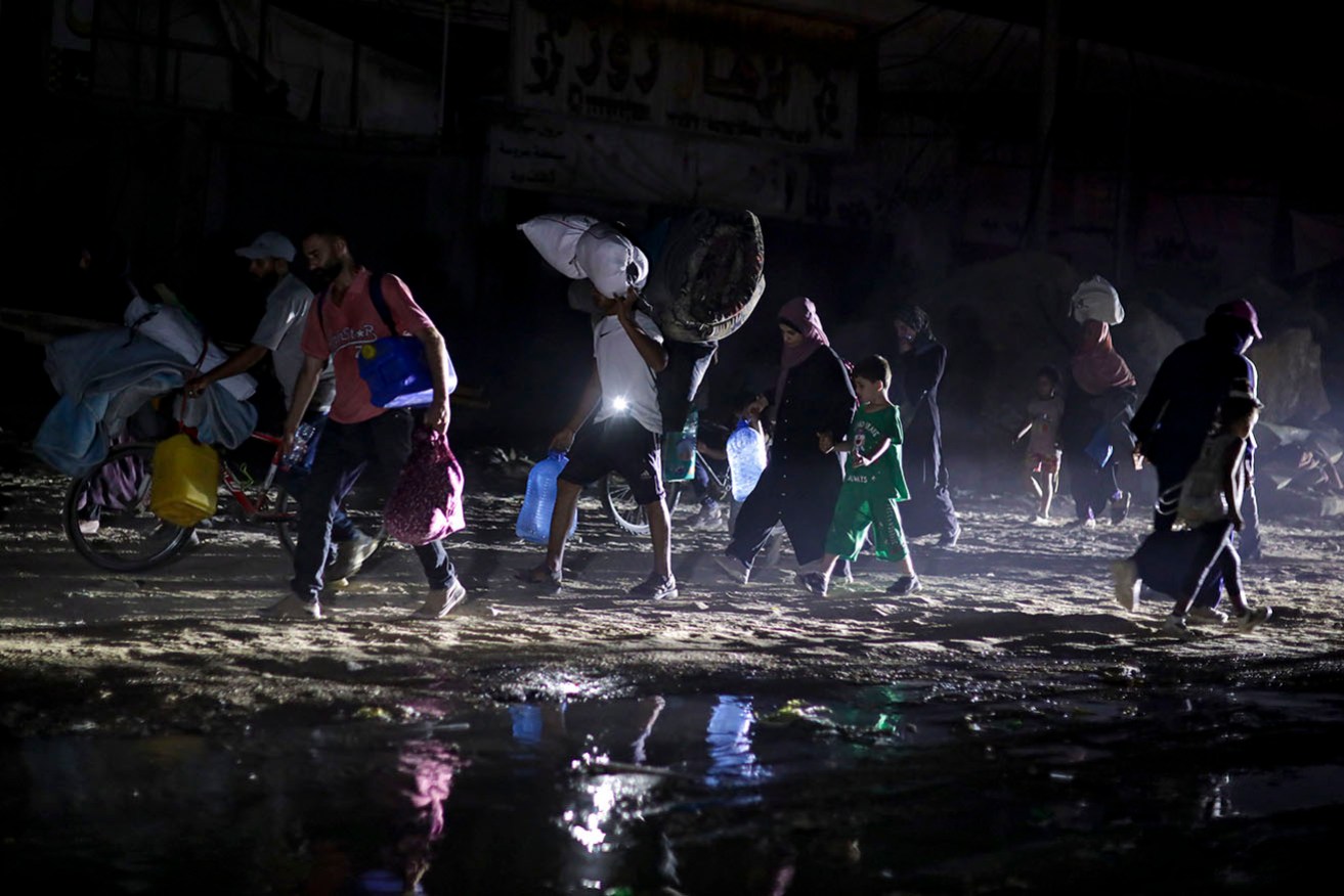 Residents fled parts of Khan Younis in southern Gaza after Israeli forces launched a fresh attack.