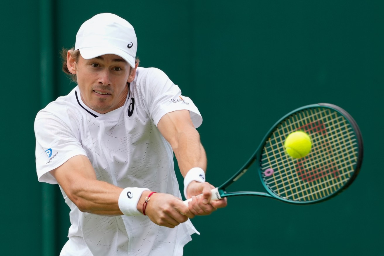 Alex de Minaur has beaten compatriot James Duckworth in the first round at Wimbledon.