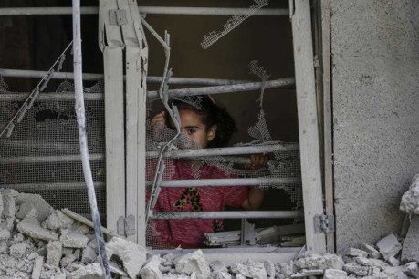 Israeli strikes kill 16 at school housing displaced