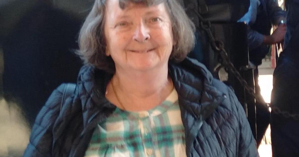 Man arrested after woman's body found at rubbish tip