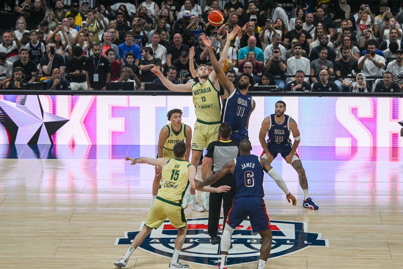 Australia have battled back from a 24-point deficit against a US team full of NBA All-Stars to lose by six points in their Olympic warm-up.