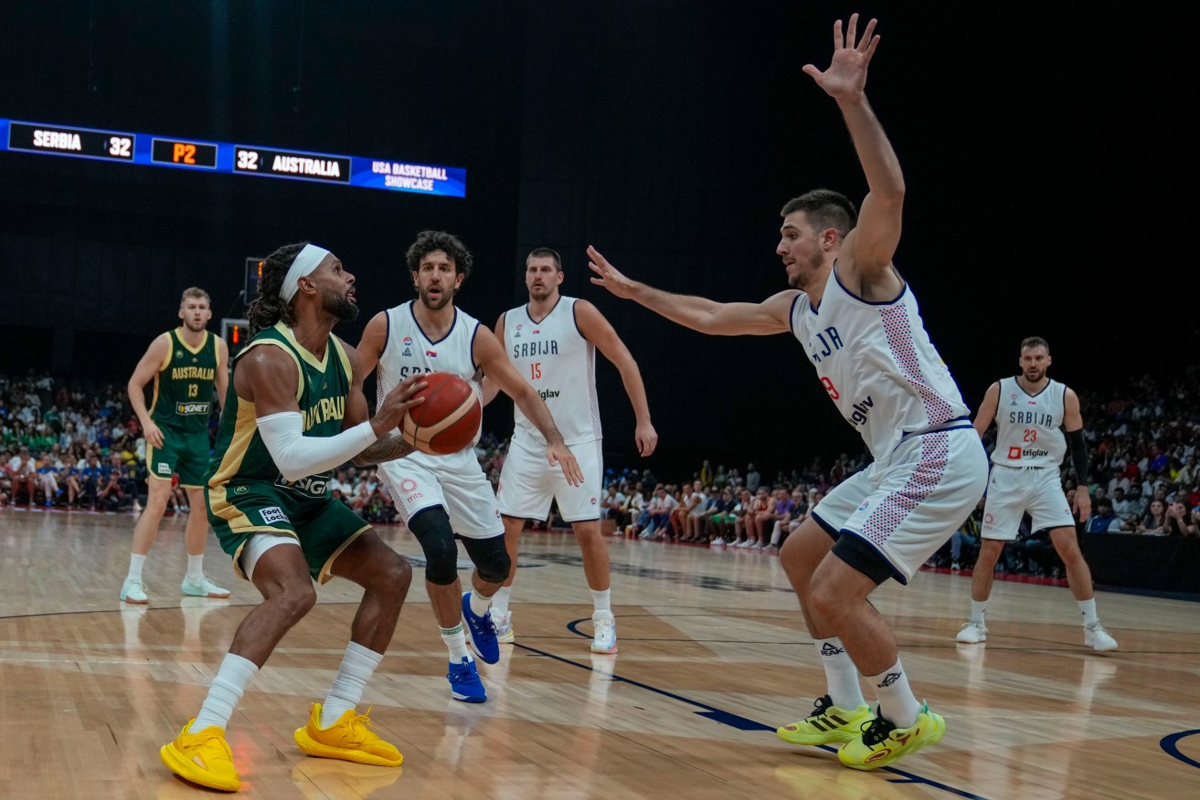 Patty Mills on the offensive during his 28-point performance against Serbia.