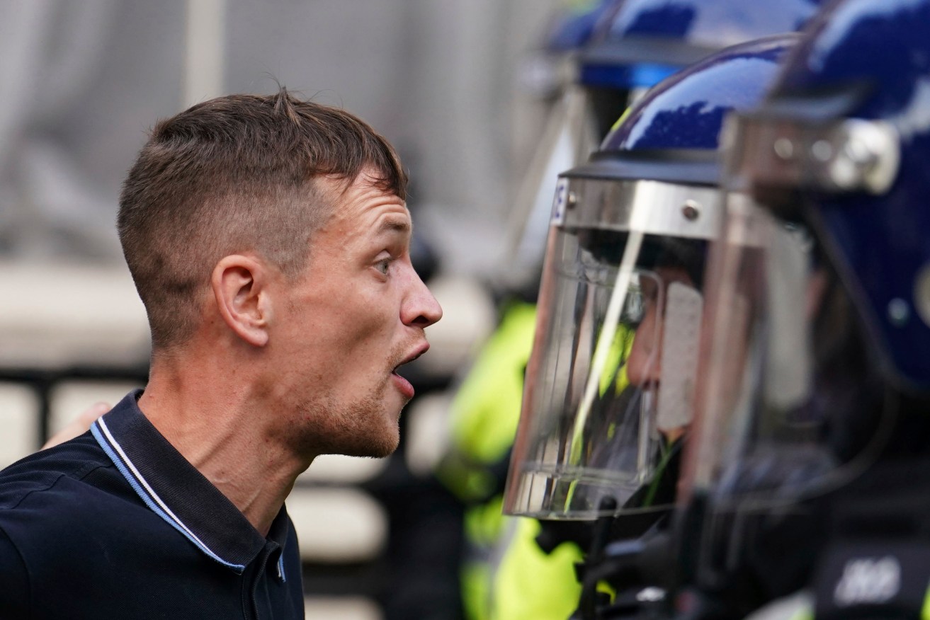 Protesters confronted police during a protest near Downing Street after a Southport stabbing attack.
