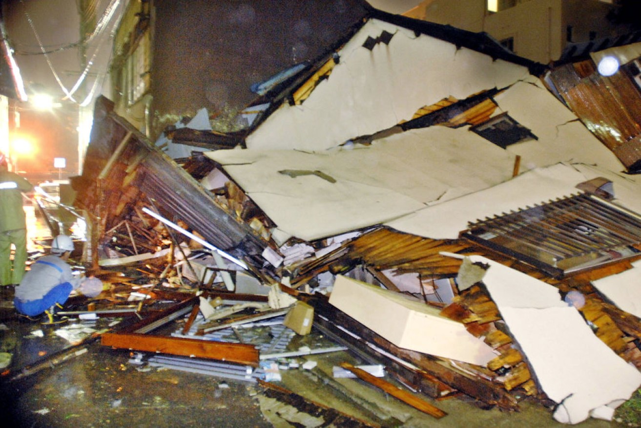 This house collapsed from heavy winds as Typhoon Shanshan hit the city of Fukuoka in Japan's southern island of Kyushu.