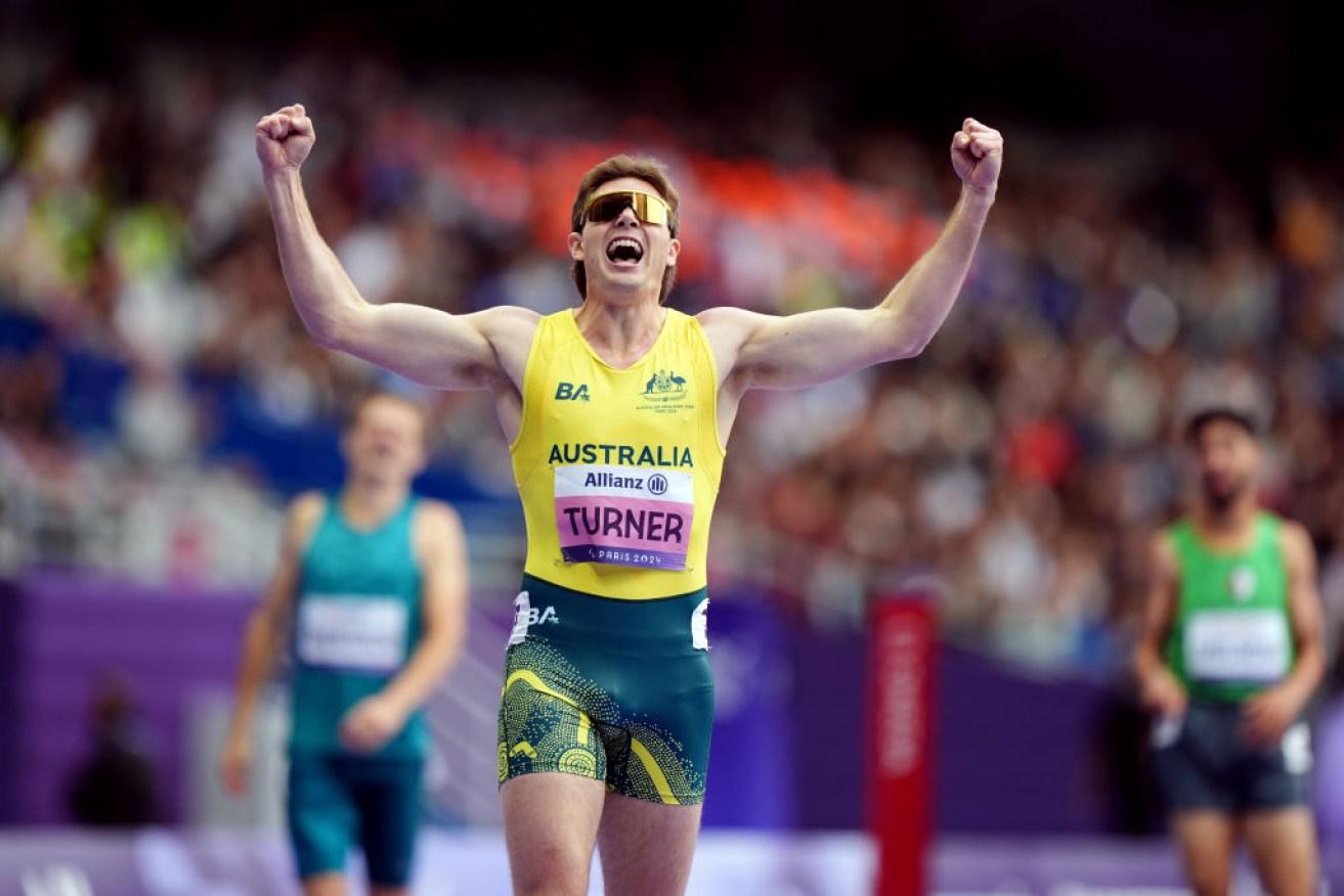 James Turner set a new world record on his way to winning the men's T36 400-metre in Paris.