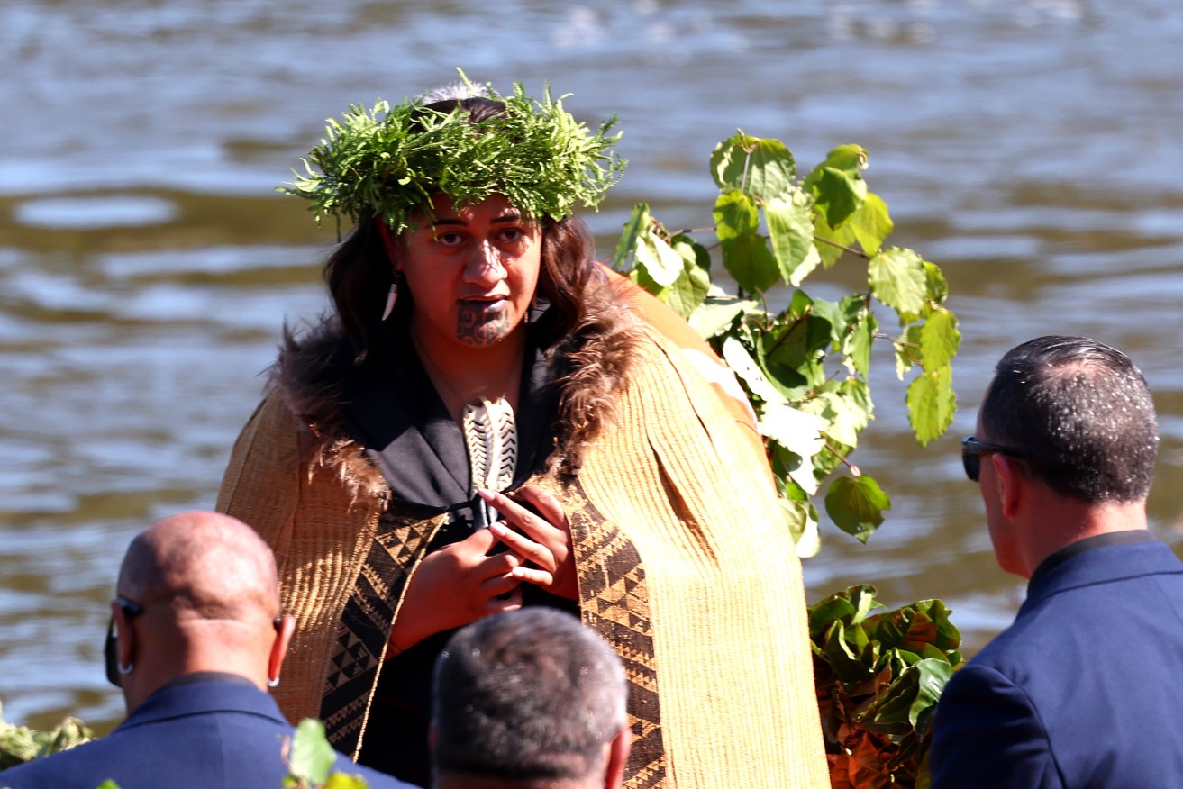 Maori Queen anointed as her father, the King, is buried