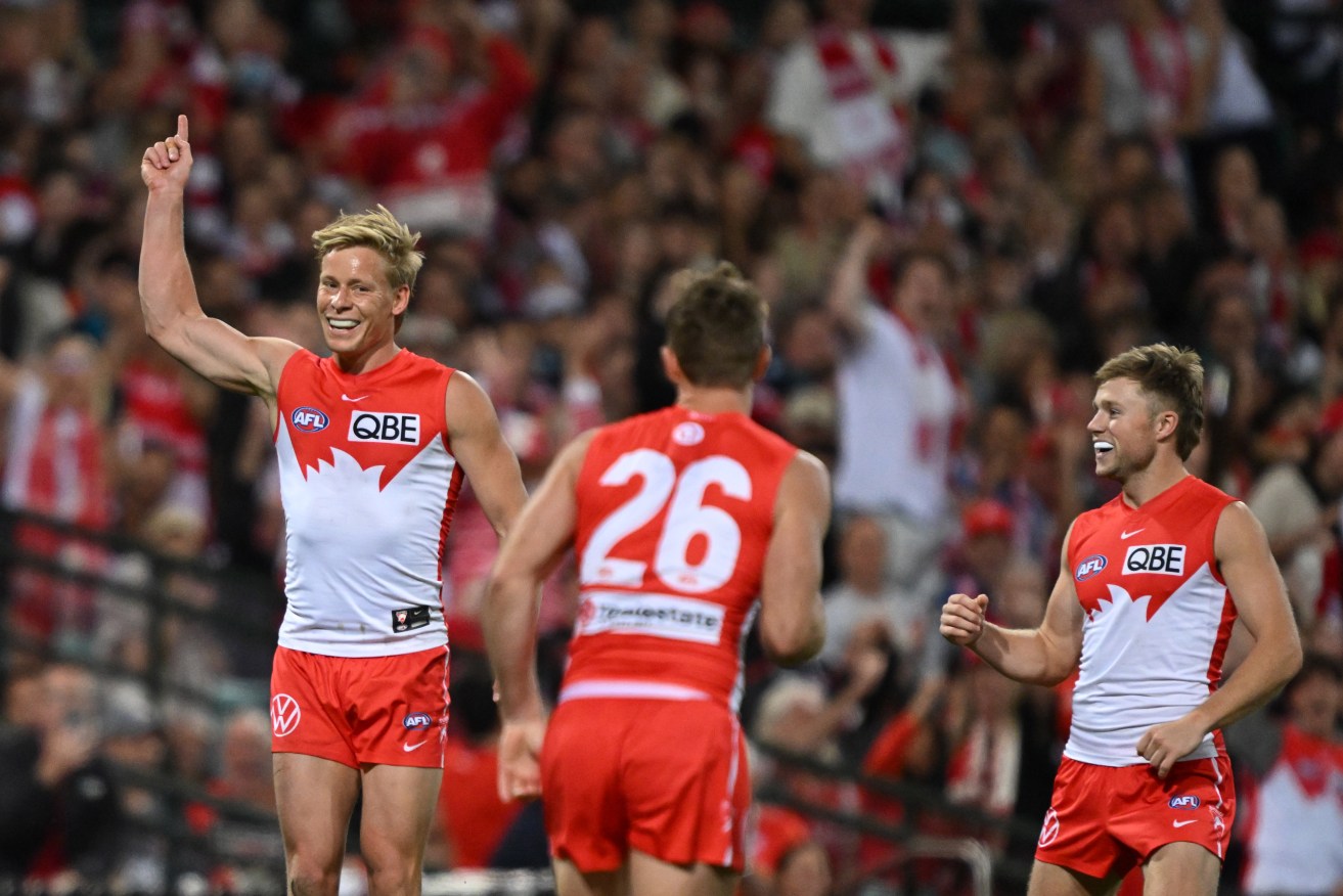 Isaac Heeney celebrates after kicking a goal during the AFL Preliminary Final match between the Sydney Swans and Port Adelaide Power.