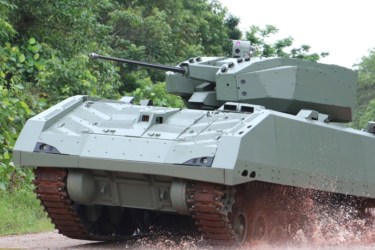 Twelve Singaporean servicemen have been hurt in a Hunter AFV crash during Queensland military exercises.