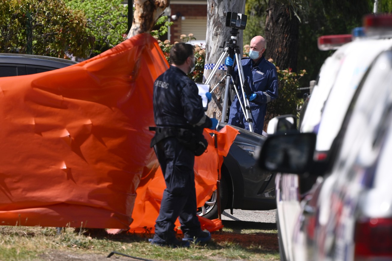Victoria Police establish a crime scene on Chris Court at Hillside in Melbourne on Friday.