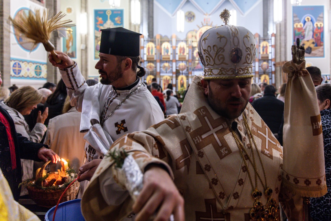 Bishop Mykola Bychok (right) and during a Ukrainian Catholic Easter celebration in Melbourne last year.