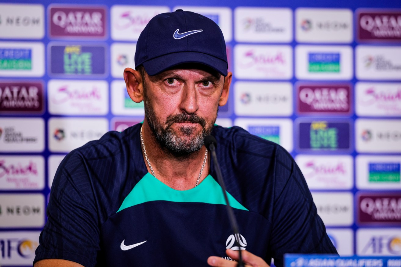 Tony Popovic gets his first taste as Socceroos coach in a must-win clash against China in Adelaide.