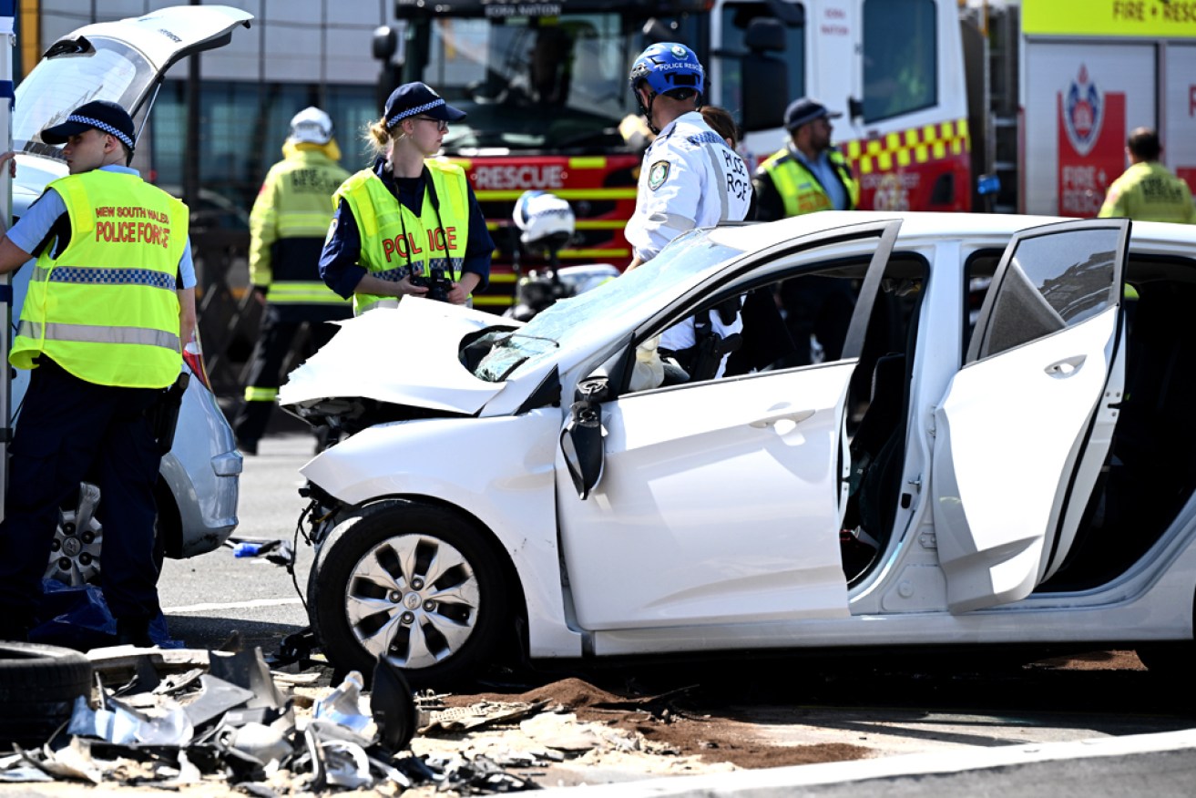 Two men are dead after the crash involving four vehicles, including a bus.