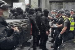 Neo-Nazis pushed away after crashing refugee camp