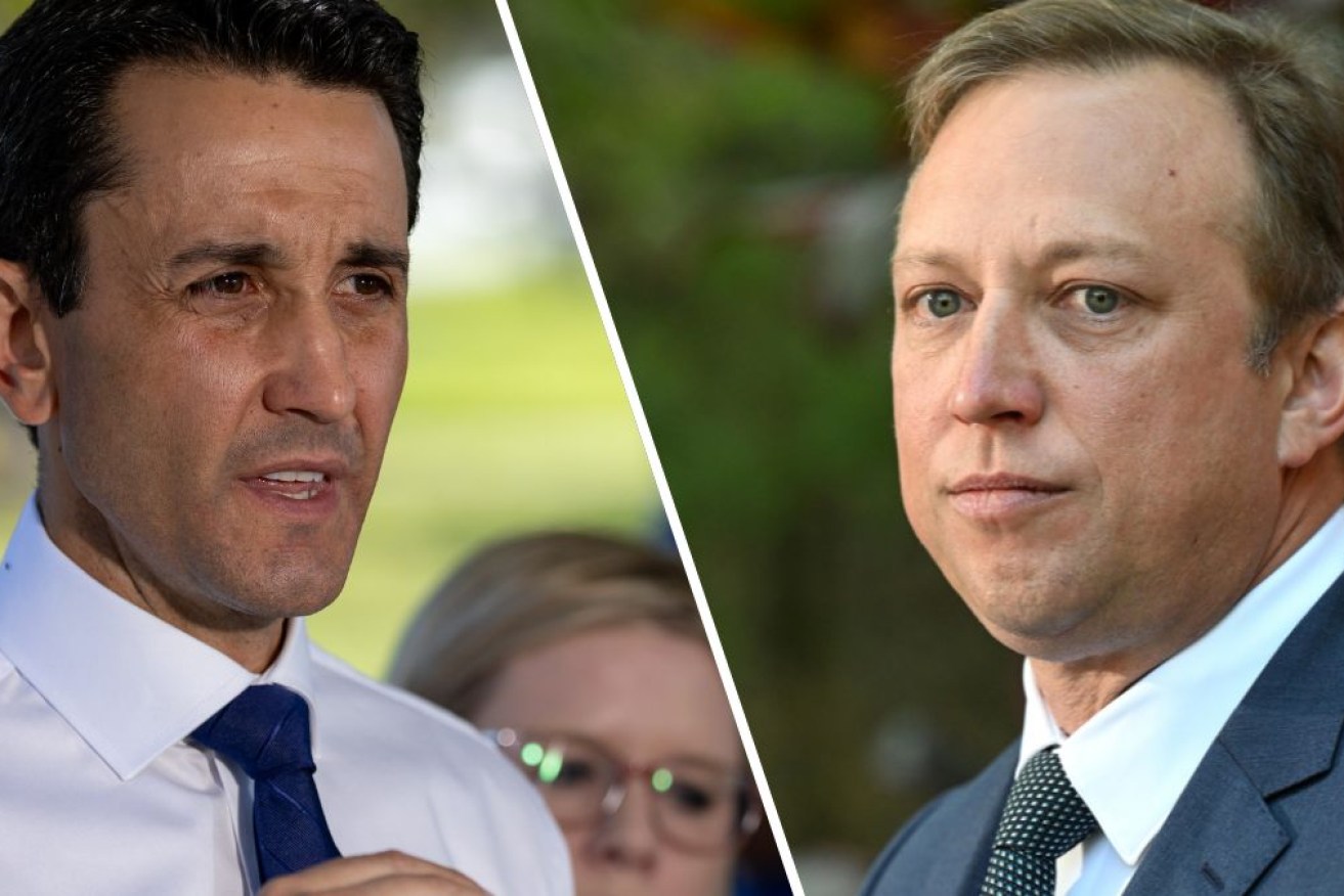 A last-minute poll shows Premier Steven Miles (right) closing the gap on the LNP's David Crisafulli.