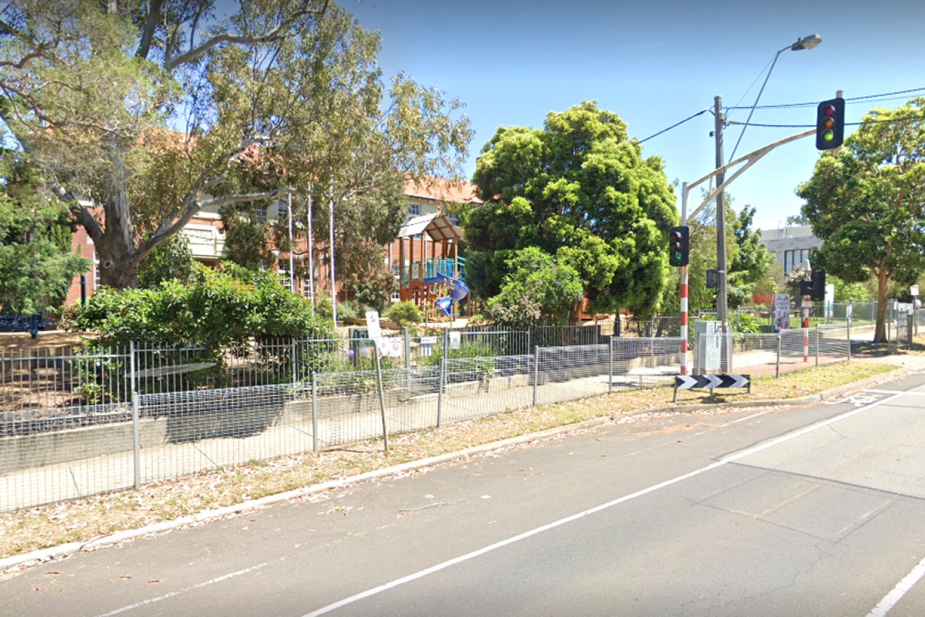 The injured children were apparently sitting on a bench outside classrooms when they were hit by the runaway car.