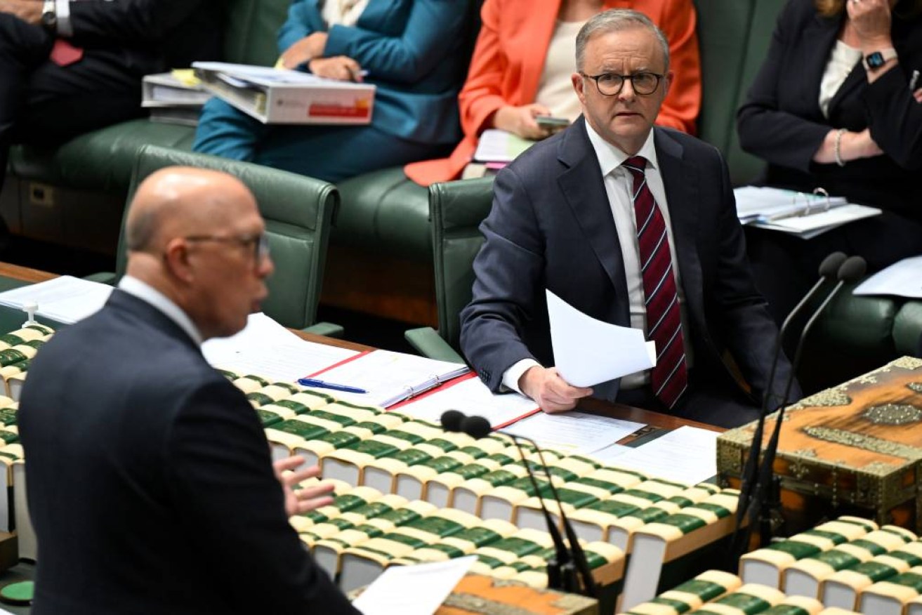 Parliament sits with both leaders encountering turbulence from controversy over flight upgrades.