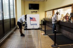 US voting under way as Harris, Trump neck and neck 