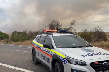 Bushfire threat finally eases but warnings to last days