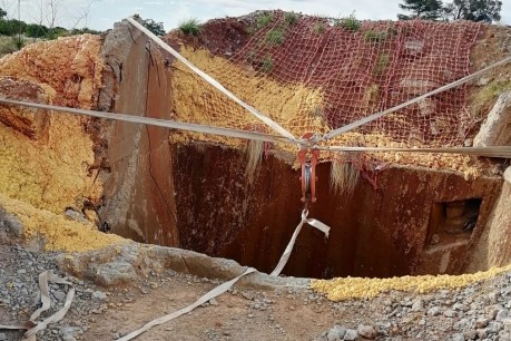 At least 100 miners dead, trapped in South Africa mine