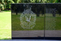 Man charged over police tribute vandalism