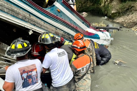 At least 50 dead in bus crash off Guatemala bridge