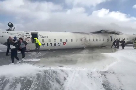 19 injured after plane flips on landing