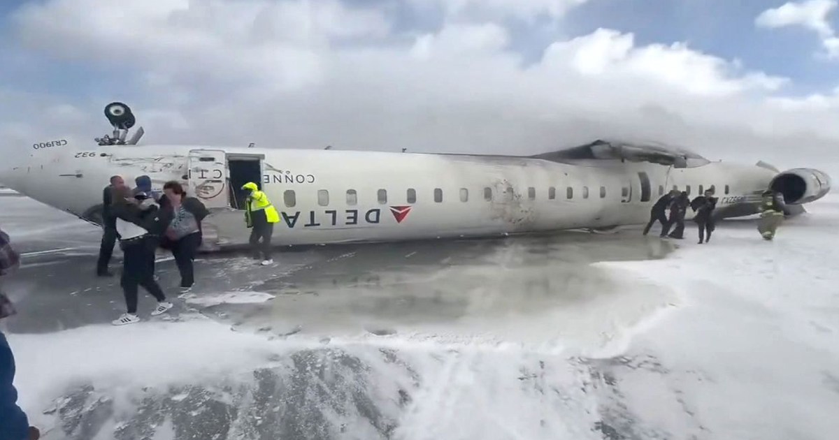 15 injured after plane flips on landing