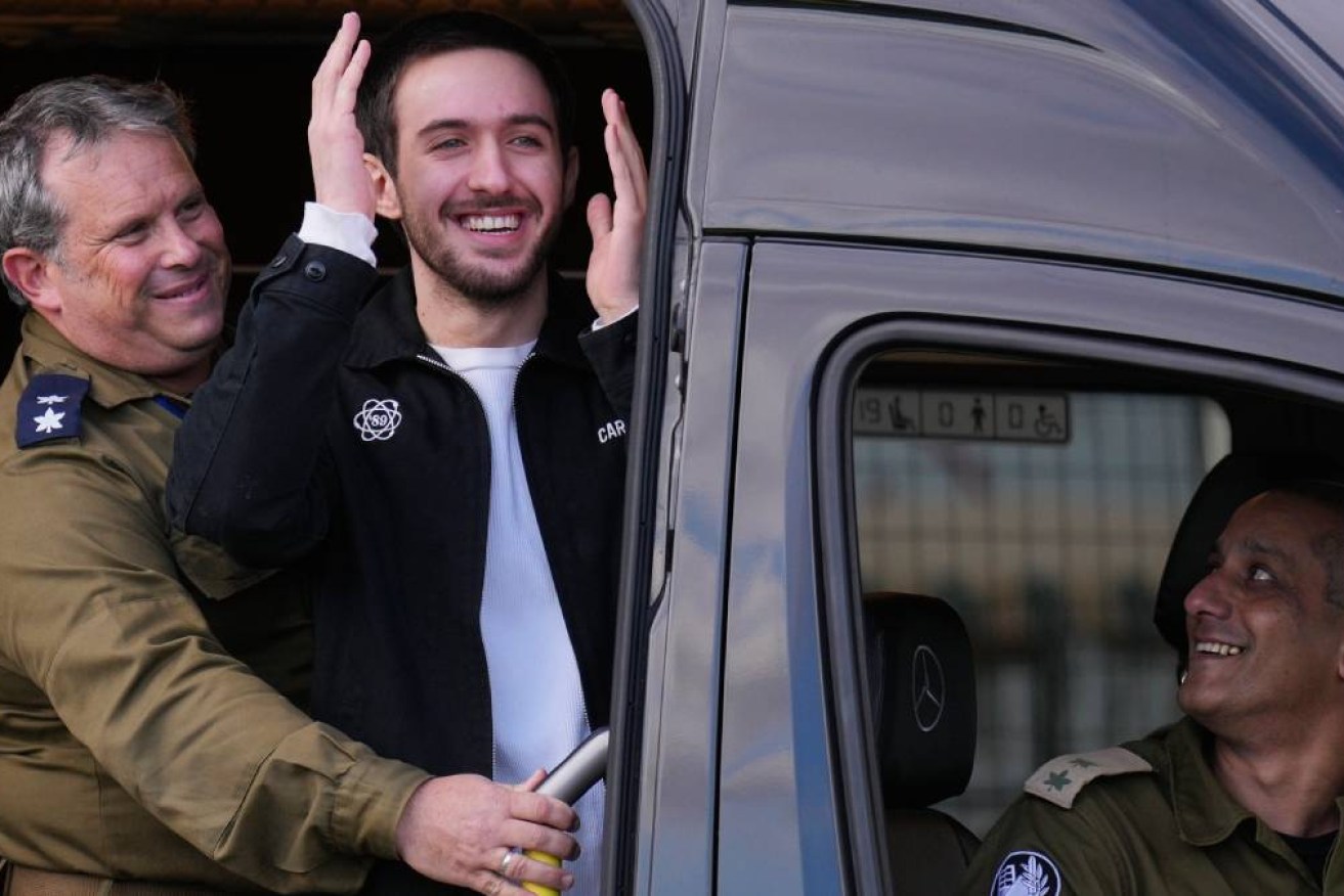 Freed Israeli hostage Omer Shem Tov embraced his parents tightly, laughing and crying.