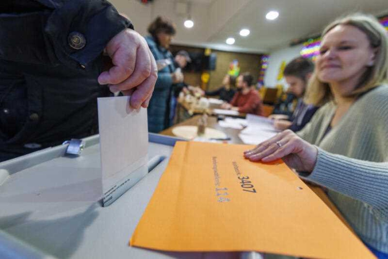 Voters cast their ballots in the German election.