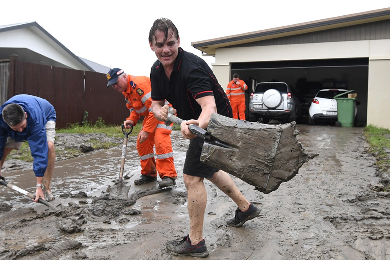 Cleaning up in Townsville after floods in 2019