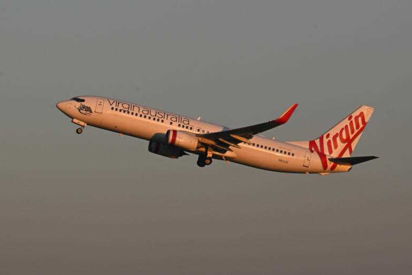 A Virgin Australia pilot alerted aviation officials to Chinese live fire exercises.