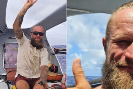 Rower caught in Cyclone Alfred safely rescued