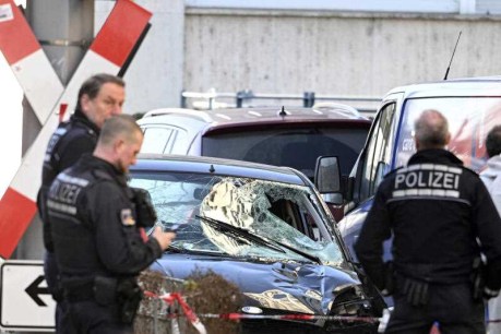 Two dead, suspect held after car hits crowd