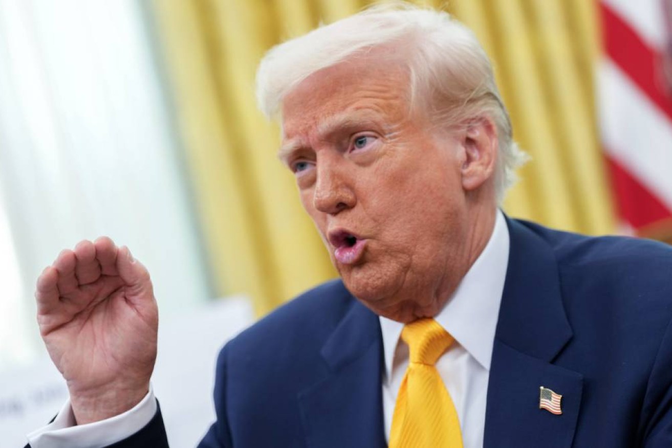 President Trump says he is "strongly considering" levying new sanctions and tariffs on Russia after a new missile attack on Ukraine.
