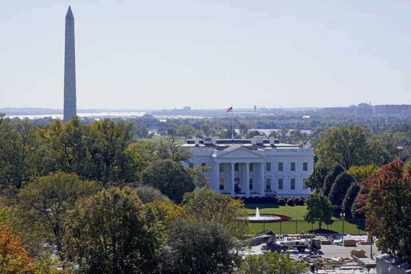 An armed man has been shot outside the White House, the US Secret Service says.