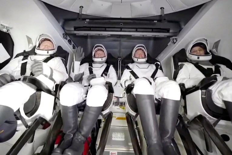 Stranded astronauts finally arrive back on Earth