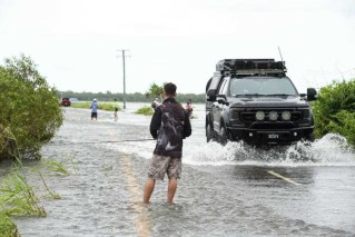 Flood warning for disaster-weary Qld residents 