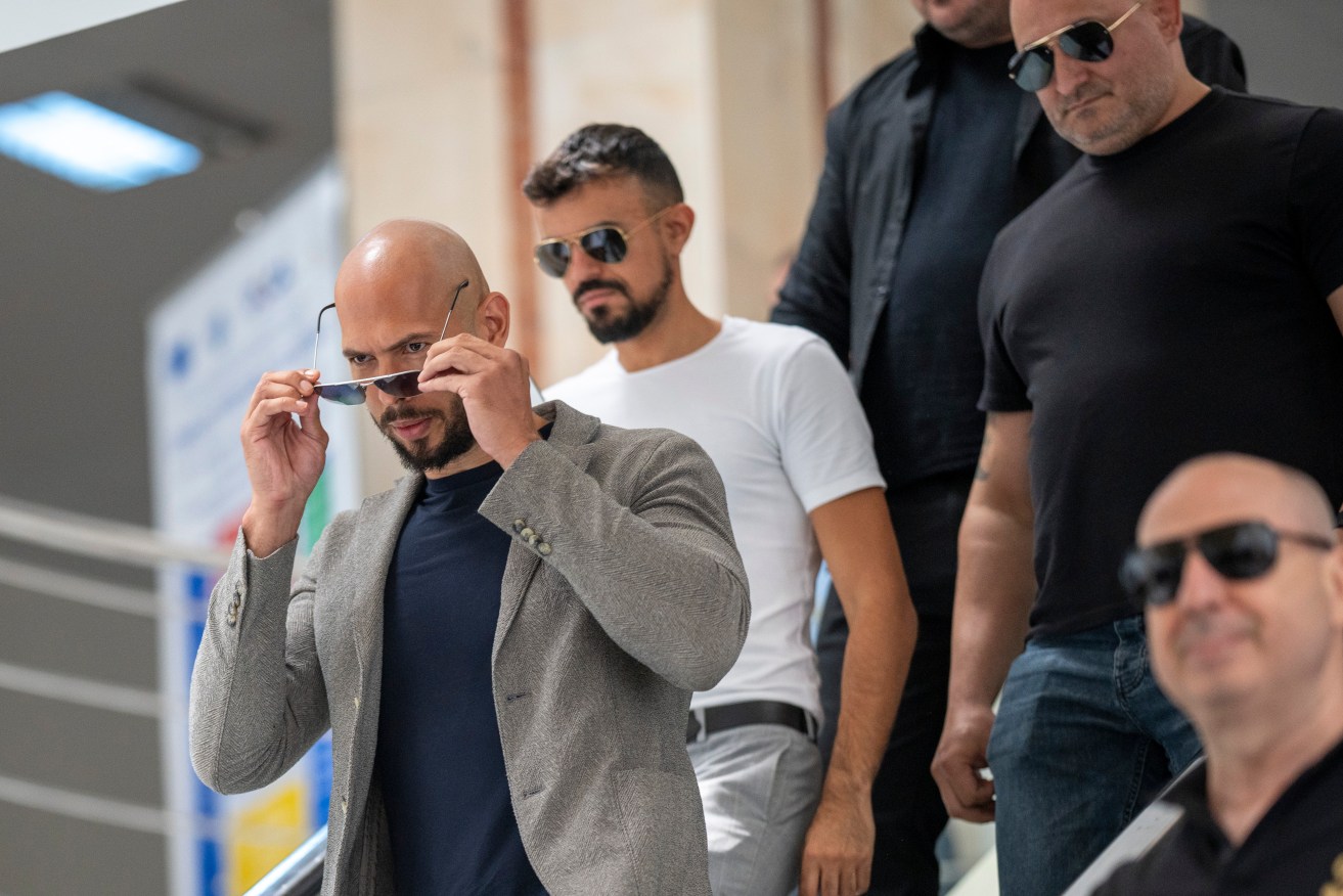 The Tate brothers are heading to Romania to meet legal requirements over sex trafficking charges.