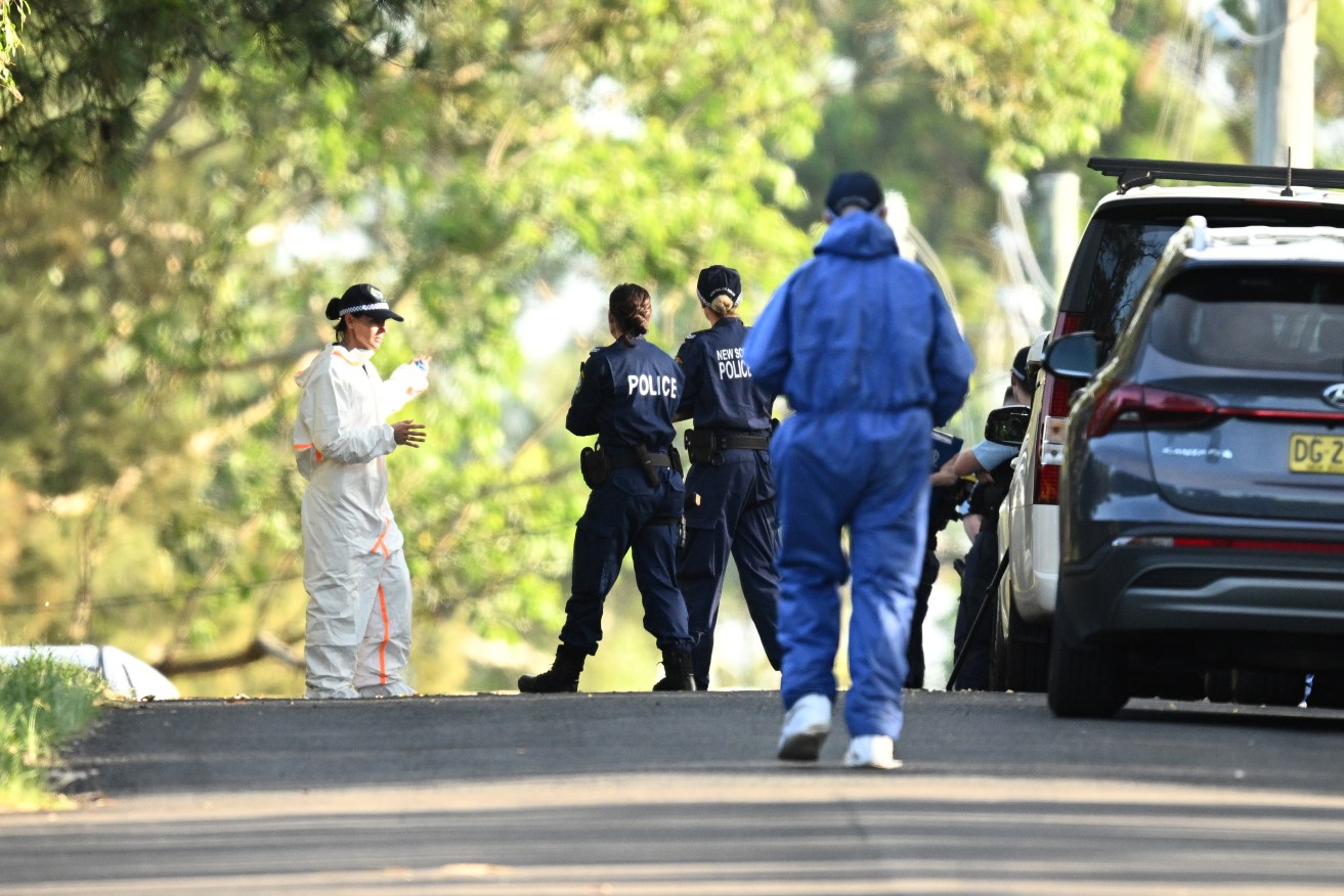 A man has been charged after human remains were found covered on a property in northwest Sydney.