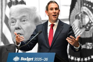 Budget delivered against dark Trump clouds
