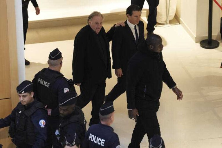 Depardieu denies assault, admits 'grabbing' woman