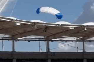Bungled entry leaves parachuter dangling