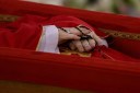 Vatican shares first photos of Pope in coffin 