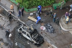 Deadly car bomb as Putin meets US envoy 